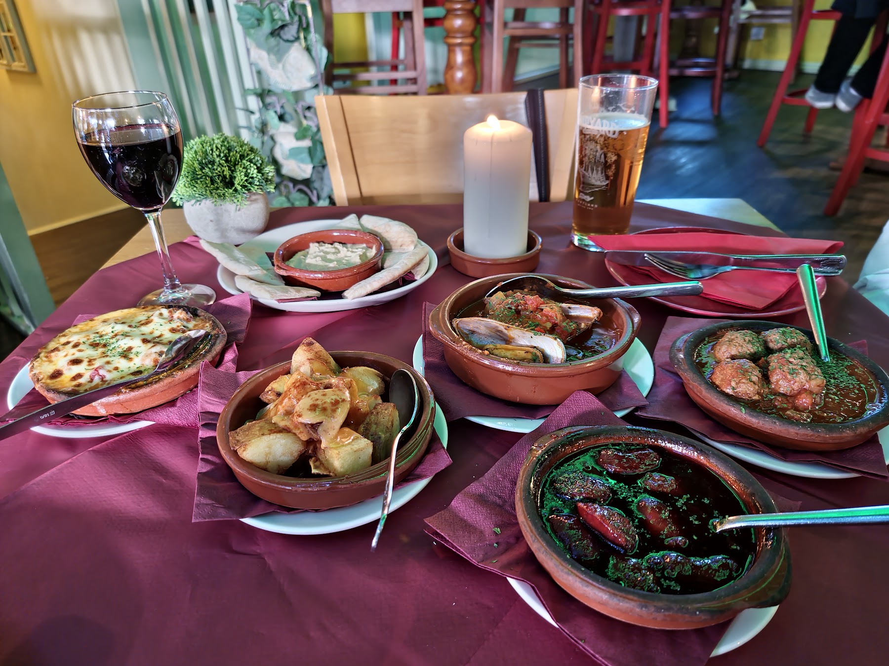 A table filled with tapas at Tapios